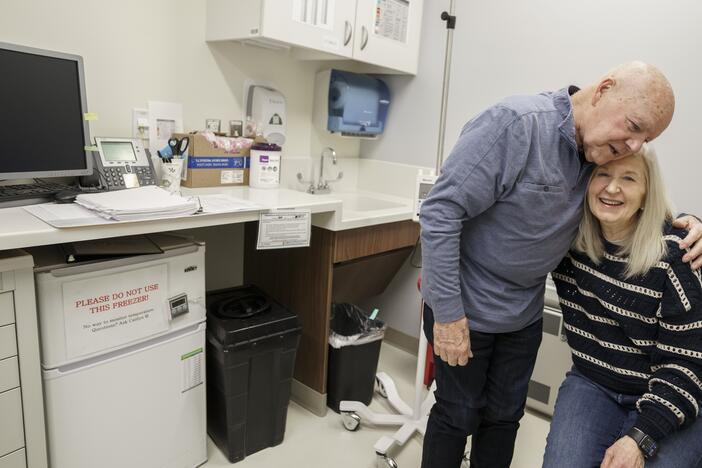 Joe Walsh, who has Alzheimer's disease, is accompanied by his wife, Karen Walsh, to an appointment at Brigham and Women's Hospital in Boston. Joe is receiving an experimental therapy to treat Alzheimer's.