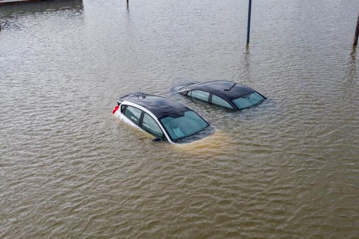 An aerial view of severe flooding in Frankfort, Kentucky, caused by days of heavy rainfall on April 7, 2025. Violent storms battering the central-eastern United States killed at least 17 people. The storms came as the National Weather Service was grappling with nearly 600 job cuts by the Trump administration. Now, the NWS has been given authorization to rehire more than 100 forecasters, radar technicians and others.