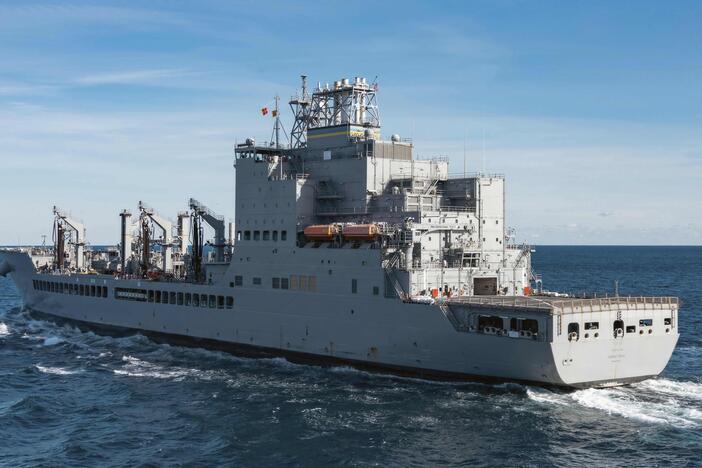 In this image provided by the U.S. Navy, the John Lewis-class replenishment oiler USNS Harvey Milk (T-AO-206) conducts a replenishment at sea in the Atlantic Ocean, Dec. 13, 2024.