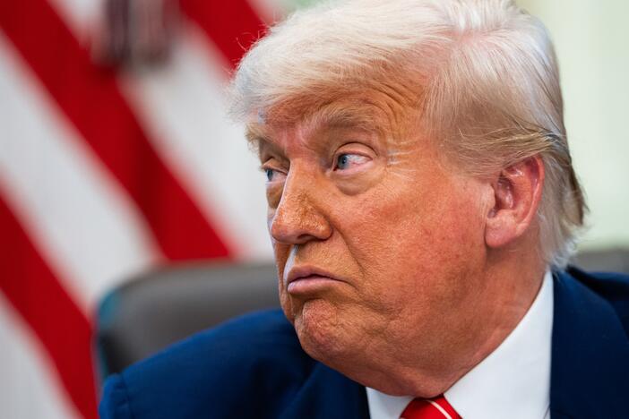 President Trump speaks during a news conference in the Oval Office of the White House in Washington.
