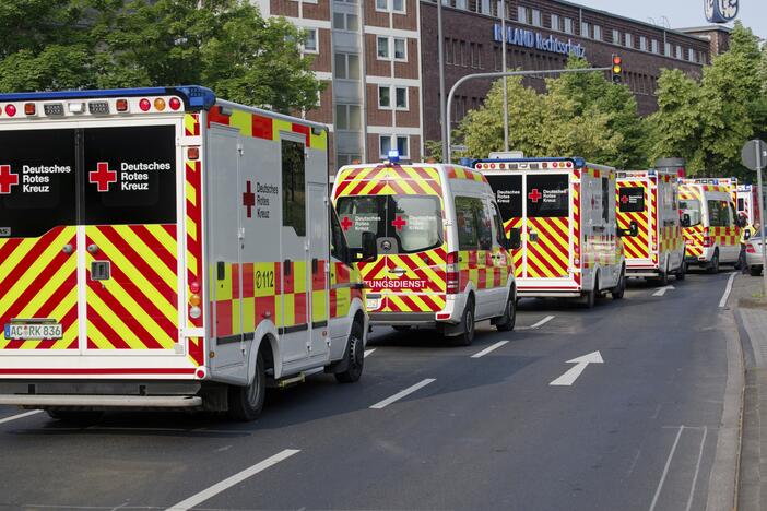 Ambulances drive to the Eduardus Hospital in Cologne-Deutz to evacuate the hospital before specialists defuse three unexploded U.S. bombs from World War II that were unearthed earlier this week in Cologne, Wednesday, June 4, 2025.