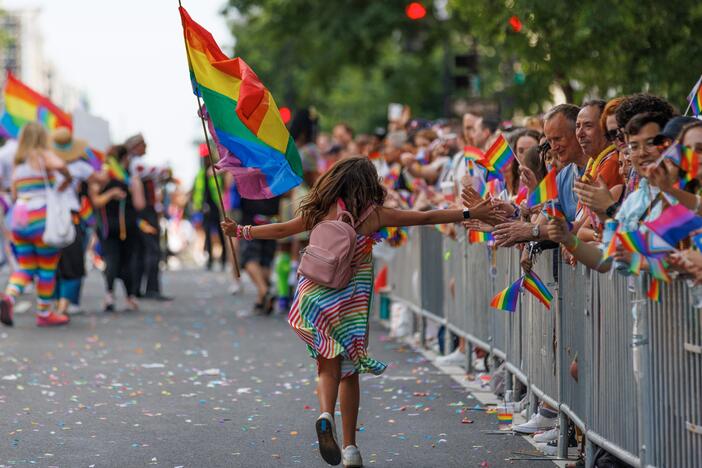 Participants march through the DC Pride Parade on Saturday, June 8, 2024 in Washington, District of Columbia in Logan Circle.