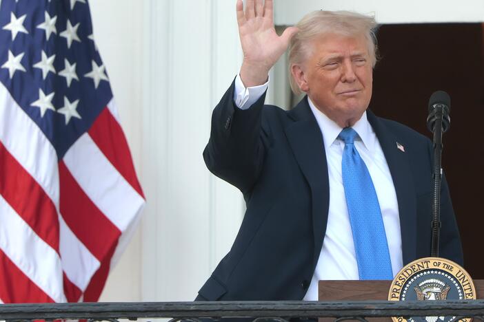 President Donald Trump waves to guests from South Portico of the White House during an event on the South Lawn on June 04, in Washington, D.C.