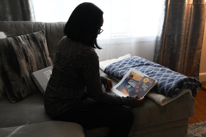 The mother of a 17-year-old boy detained in the Prince George's County Detention Center bought greeting cards for her son but couldn't bring herself to mail them. Beneath the cards is a photo of her son in a science lab at his high school.