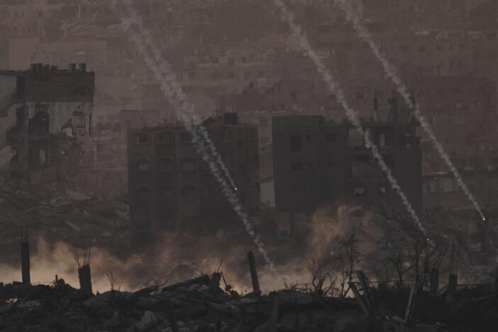 Israeli shelling hits an area in the northern of Gaza Strip as seen from southern Israel, Tuesday.
