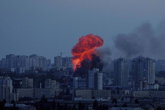 Explosion is seen after Russian air strike on Kyiv, Ukraine, on Friday.