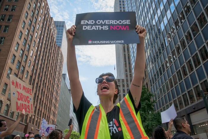 A protestor marks International Overdose Awareness Day in Manhattan last August. Overdose deaths were down in recent months, and Democrats are questioning the wisdom of changing policies that are show progress.