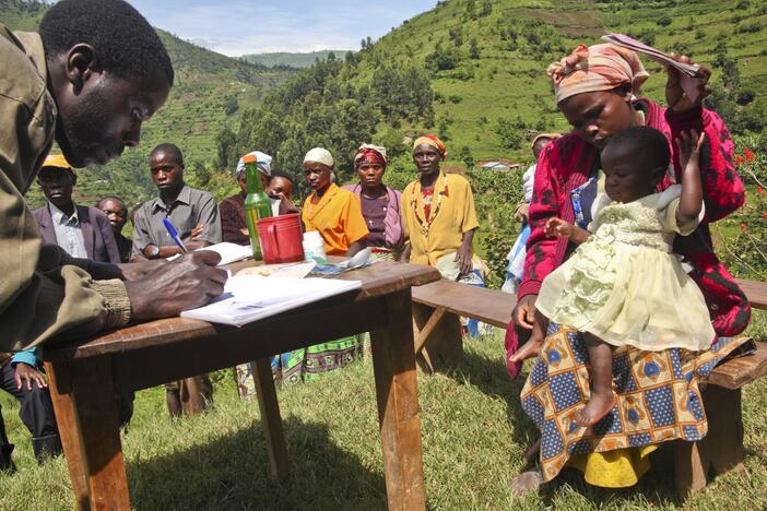 Ugandans in Kabale line up for treatment for river blindness, a "neglected tropical disease" caused by a parasitic roundworm and transmitted by the bite of the black fly. The drug ivermectin, donated by a pharmaceutical company, kills the roundworm larvae. But now there's a freeze on the U.S. aid program that distributes the drug.