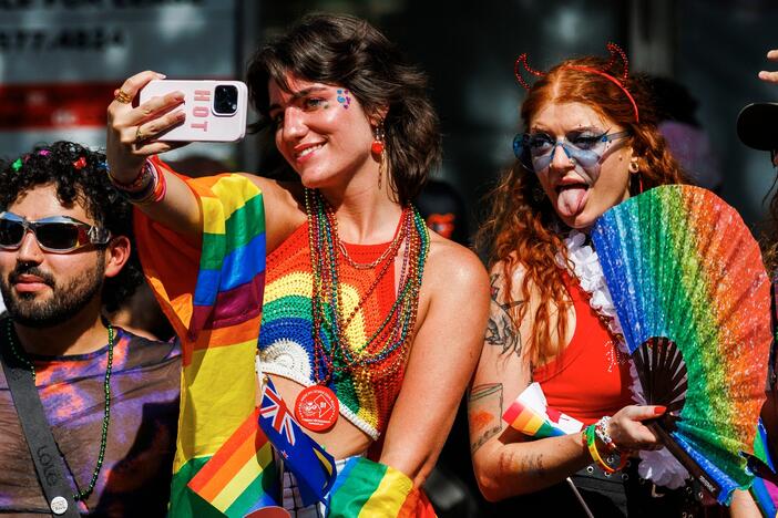 Participants watch the Capital Pride Parade in 2024 in Washington, D.C.