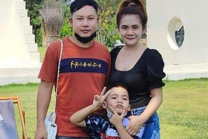 This undated photo provided by the Hostage's Family Forum shows Nattapong Pinta, with his wife and son.