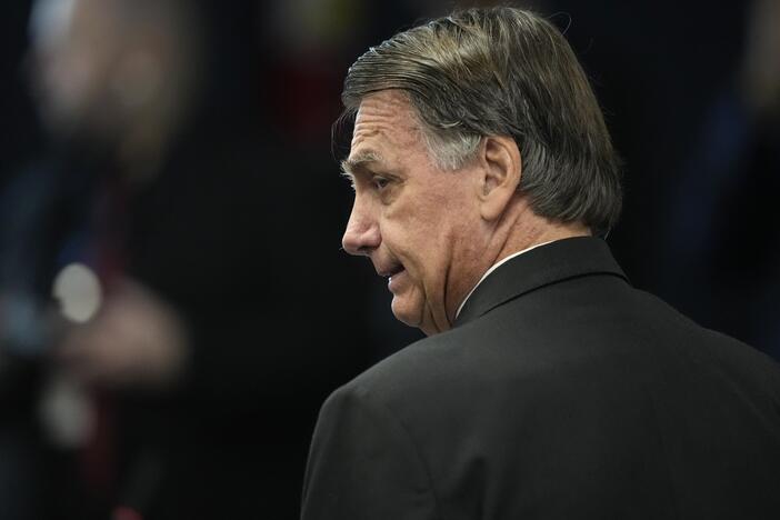 Former Brazilian President Jair Bolsonaro attends his Supreme Court trial along with others charged in an alleged coup plot to keep him in office after his 2022 election defeat, in Brasilia, Brazil, Tuesday, June 10, 2025.