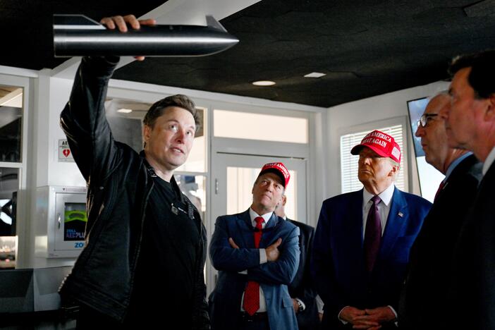 Elon Musk gives a tour to then-President-elect Trump and lawmakers of the control room before the launch of a SpaceX Starship rocket on Nov. 19, 2024, in Brownsville, Texas. Musk's businesses have been built with billions of dollars of government support that could be at risk after his relationship with Trump ruptured this week.