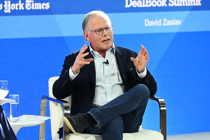 Warner Bros. Discovery chief David Zaslav, shown at a <em>New York Times</em> event in 2023, announced on Monday that the company would be split, with its streaming and Hollywood studios on one side, and its cable properties on the other. The company currently includes HBOMax, Warner Bros. movie and television studios, and CNN among its properties.