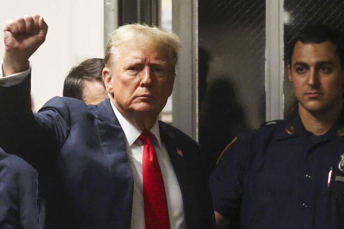 President Trump, shown at Manhattan criminal court in New York, May 28, 2024, before he was re-elected, reacts as he walks back into the courtroom after a break during closing arguments in his hush money trial.