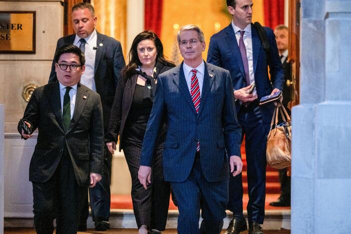 U.S. Treasury Secretary Scott Bessent, second right, departs after trade talks at Lancaster House in London on Tuesday.
