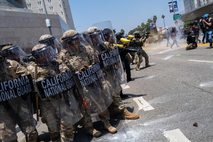 Demonstrators protest outside a downtown jail in Los Angeles following clashes with police during a series of immigration raids on June 08 in Los Angeles, California.