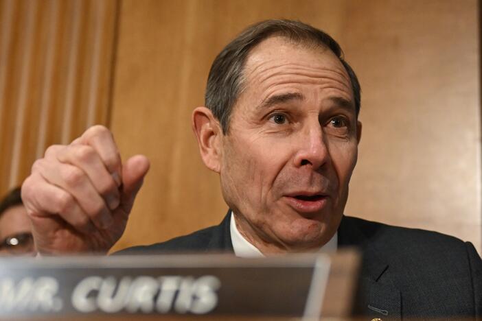Republican Sen. John Curtis of Utah, seen here on Capitol Hill in January,  wants to see a careful evaluation of the merit of each tax credit and thoughtful phase-outs. (Photo by ANDREW CABALLERO-REYNOLDS / AFP) (Photo by ANDREW CABALLERO-REYNOLDS/AFP via Getty Images)