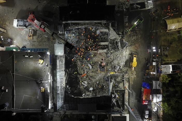 Rescue workers search for bodies at the Jet Set nightclub after its roof collapsed during a merengue concert in Santo Domingo, Dominican Republic in April.