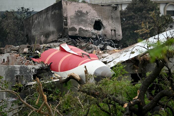Debris of Air India flight 171 is pictured after it crashed Thursday in a residential area near the airport in Ahmedabad. Rescue teams with sniffer dogs combed the crash site on Friday.