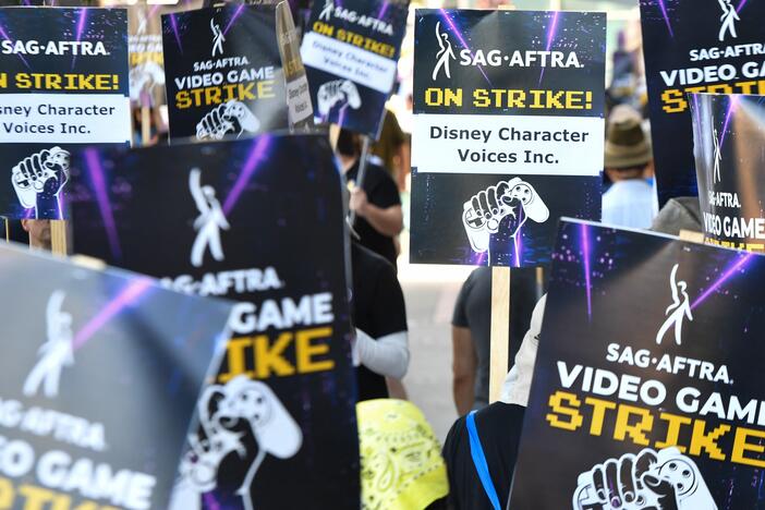 Striking performers picket outside Disney Character Voices, a subsidiary of The Walt Disney Company, in Burbank, California, in August.