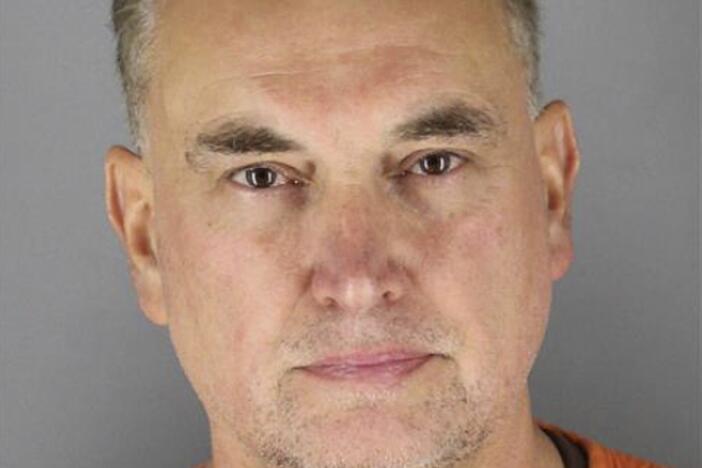 This booking photo provided by the Hennepin County Sheriff's Office shows Vance Boelter in Green Isle, Minn., early Monday morning — shortly after a two-day manhunt ended in his capture and arrest.