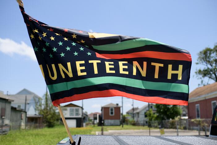 A Juneteenth flag flies on a float during the 45th annual Juneteenth National Independence Day celebrations in Galveston, Texas in 2024.