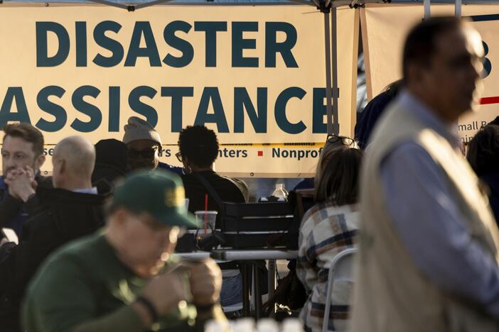 People impacted by the wildfires seek information and relief at a FEMA Disaster Recovery Center in 2025, in Pasadena, Calif. The leader of FEMA's top disaster response coordination office has resigned, as President Trump moves to eliminate the agency.