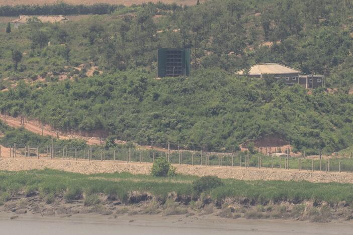 This photo shows a general view of a North Korean giant loudspeaker (C), near the Demilitarized Zone (DMZ) dividing the two Koreas, in Paju on June 12, 2025.
