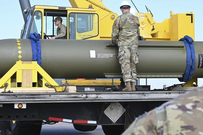 Airmen look at a GBU-57, or a Massive Ordnance Penetrator bomb, at Whiteman Air Force Base in Missouri on May 2, 2023.