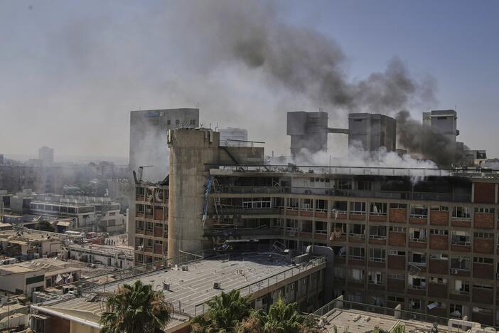 Smokes rises from a building of the Soroka hospital complex after it was hit by a missile fired from Iran in Be'er Sheva, Israel on Thursday.