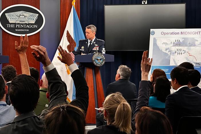 Secretary of Defense Pete Hegseth (L) and Gen. Dan Caine, chairman of the Joint Chiefs of Staff, (R) attend press conference at Pentagon June 22.