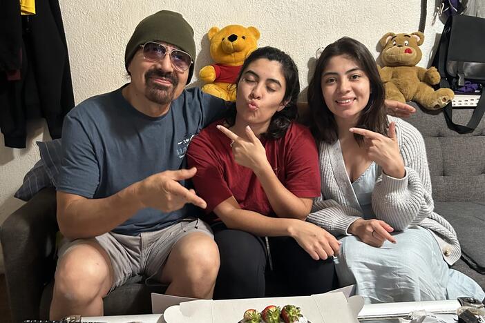 Francisco Urizar celebrates his 64th birthday with his daughters Nancy (center) and Francis (right). Since her father was taken into Immigrations and Customs Enforcement custody earlier in the week, Nancy has been frantically searching for clues about where, and why, he has been detained.
