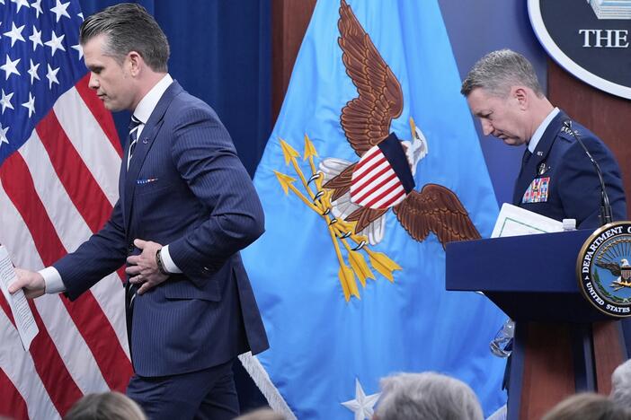 Defense Secretary Pete Hegseth and Joint Chiefs Chairman Gen. Dan Caine depart at the end of a news conference at the Pentagon in Washington, Sunday, June 22, after the U.S. military struck three sites in Iran, directly joining Israel's effort to destroy the country's nuclear program.