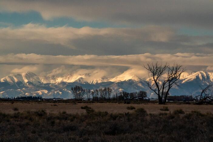 The Sangre de Cristo mountains loom over Colorado's San Luis Valley. Many in this agricultural region voted for President Trump and are deeply concerned about cuts to Medicaid.