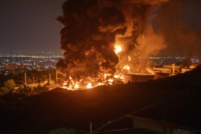 Fire and smoke rise after an Israeli attack on the Shahran oil depot on June 15 in Tehran, Iran.