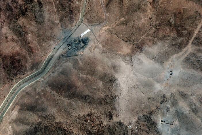 A satellite image of Iran's Fordo nuclear site shows clusters of new holes likely caused by U.S. bunker buster bombs dropped over the weekend following orders by President Trump.