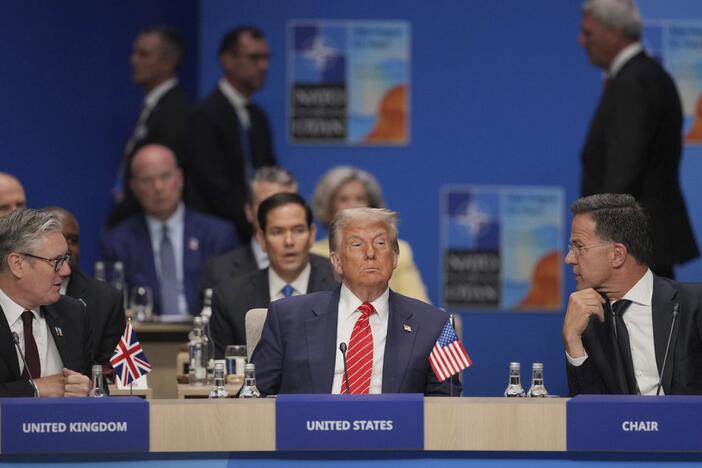 Britain's Prime Minister Keir Starmer and U.S. President Donald Trump listen to NATO General Secretary Mark Rutte during a North Atlantic Council plenary meeting at the NATO Summit on June 25 in The Hague, Netherlands.