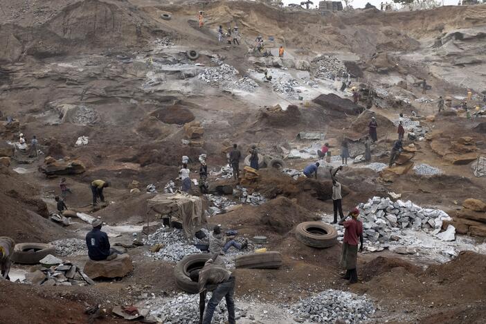 Children work alongside adults in a quarry in Ouagadougou, the largest city in Burkina Faso.