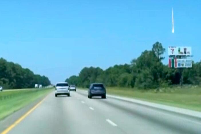 In this photo taken from video shows a bright object traveling in the sky in McDonough, Ga., on June 26, 2025.