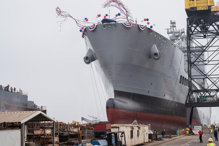 The USNS Harvey Milk departs the General Dynamics NASSCO shipyard after a christening ceremony in San Diego, on Nov. 6, 2021. The ship has been renamed the USNS Oscar V. Peterson, after a World War II naval officer, Secretary of Defense Pete Hegseth announced Friday.