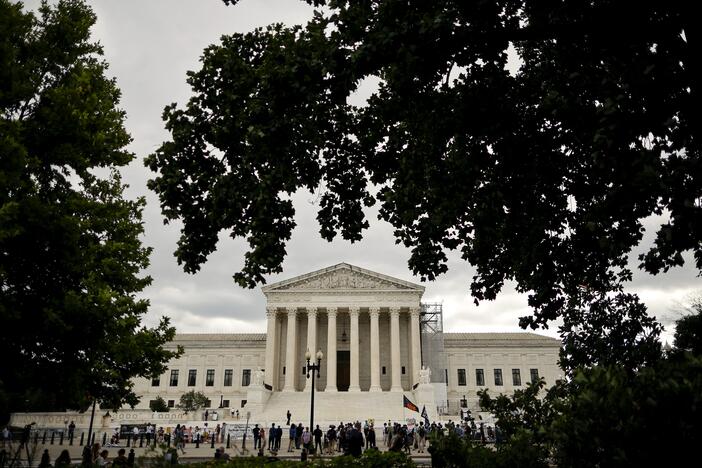 People gather outside the U.S. Supreme Court.