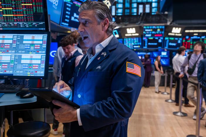 The S&P 500 index closed in record territory Friday, rebounding from a spring slump tied to President Trump's trade war.