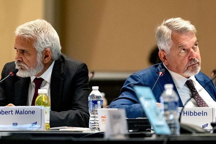 New committee members Dr. Robert Malone, left, and Dr. Joseph Hibbeln during the first meeting of the CDC's Advisory Committee On Immunization Practices at the Centers for Disease Control and Prevention in Atlanta, Ga.
