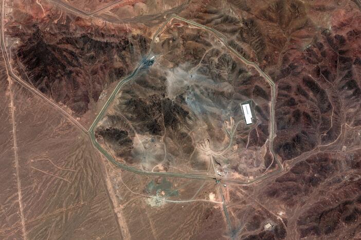 A satellite photo of Iran's Fordo fuel enrichment facility taken on June 24 shows debris (grey) from a U.S. strike employing several bunker-busting weapons. The Israeli Air Force destroyed additional roads and surface facilities in a subsequent strike.