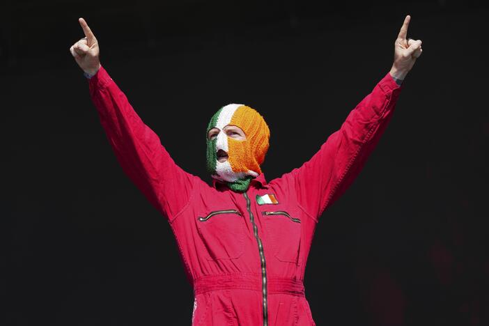 J. J. O Dochartaigh from the hip hop trio Kneecap performs during the Glastonbury Festival in Worthy Farm, Somerset, England, Saturday, June 28, 2025.