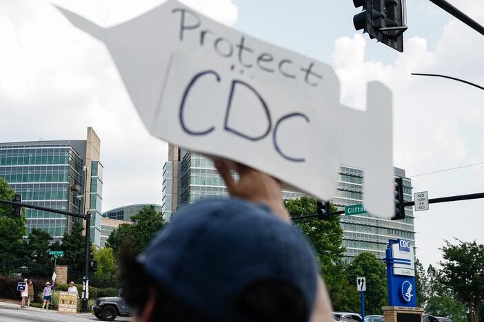 Protesters gather outside the Centers for Disease Control and Prevention in Atlanta on Wednesday, during a controversial vaccine advisory committee meeting.