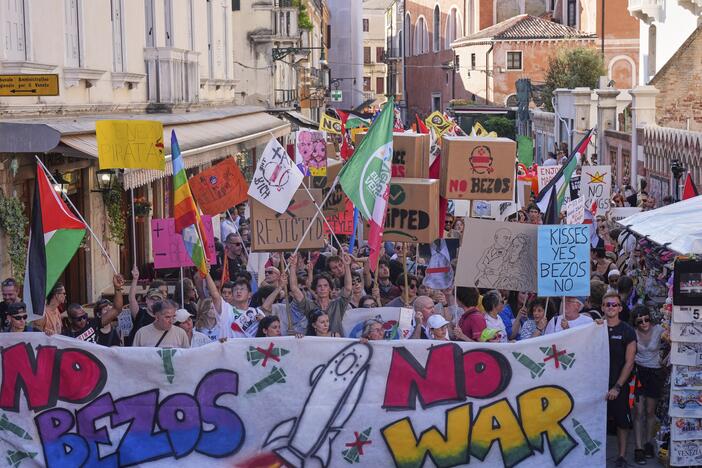 Activists stage a protest in Venice, Italy, Saturday, June 28, 2025, denouncing the three-day celebrations for the wedding between Jeff Bezos and his wife Lauren Sanchez Bezos that took place in Venice.