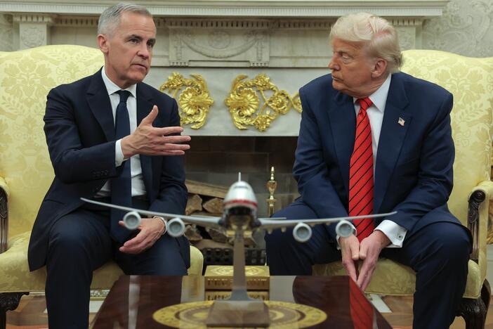 President Trump meets with Canadian Prime Minister Mark Carney in the Oval Office at the White House in Washington, D.C., on May 6, 2025. Carney's government said on Sunday it would scrap a tax on U.S. tech companies after Trump threatened higher tariffs on Canadian goods.