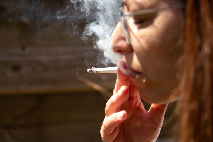 A woman smokes a cigarette at Kerlouan in Brittany in France on May 30. The country is banning smoking in many public places.