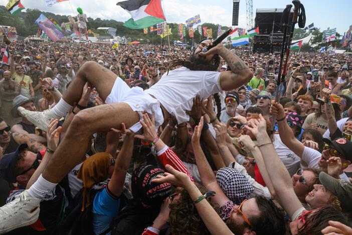 Bobby Vylan of Bob Vylan crowdsurfs in front of the West Holts stage during day four of Glastonbury festival 2025 on June 28 in Glastonbury, England.